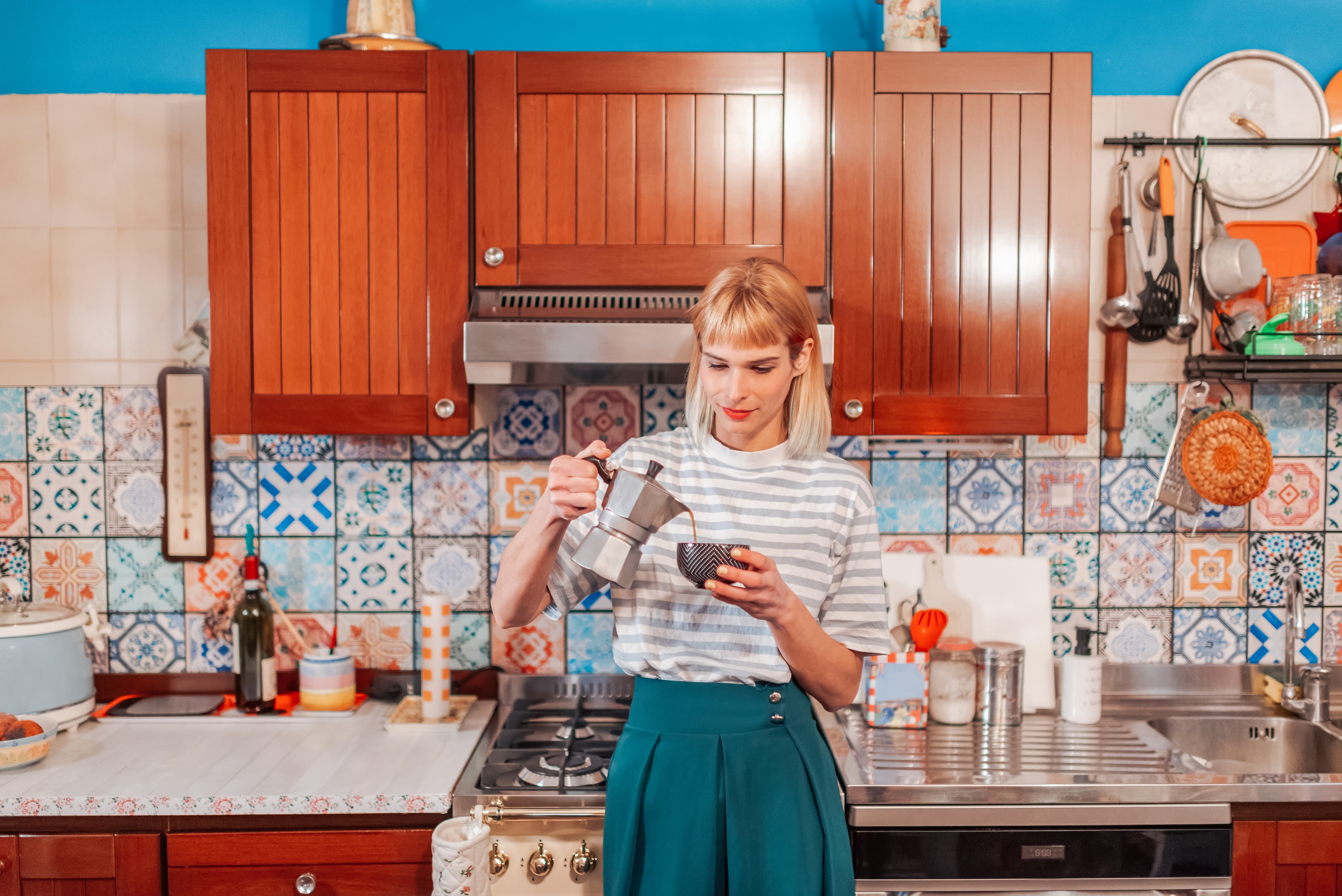 woman pouring coffee